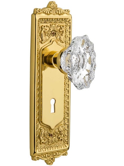 Egg and Dart Mortise-Lock Set with Chateau Crystal Glass Knobs in Polished Brass.